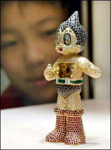 Astro Boy feito com pedras de diamantes, esmeraldas e rubis